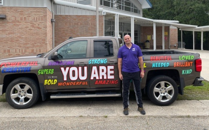 Northshore middle school teacher decorates truck with positive affirmations, encourages students to be kind