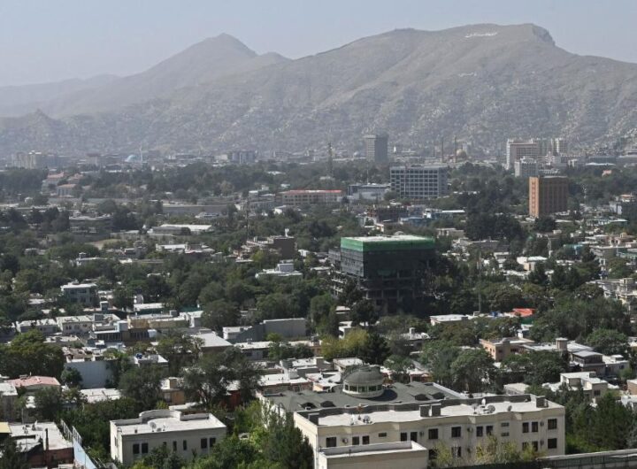Taliban and Afghan government in talks as the militant group surrounds the capital of Kabul