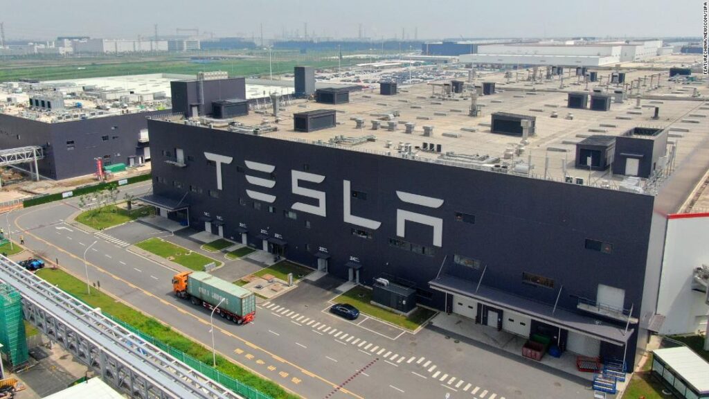 Tesla Model 3 cars are displayed during the Tesla China-made Model 3 Delivery Ceremony in Shanghai. - Tesla CEO Elon Musk presented the first batch of made-in-China cars to ordinary buyers on January 7, 2020 in a milestone for the company's new Shanghai "giga-factory", but which comes as sales decelerate in the world's largest electric-vehicle market. (Photo by STR / AFP) / China OUT (Photo by STR/AFP via Getty Images)