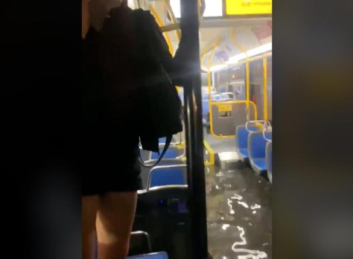 Queens NY floodwaters force bus riders to stand on their seats - CNN Video