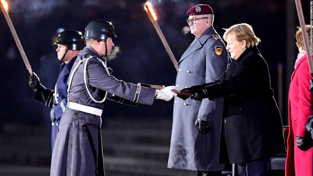 German military honors outgoing Chancellor Angela Merkel with punk rock sendoff