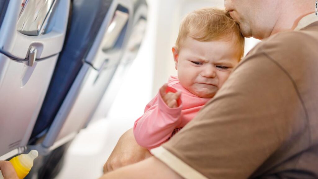 Travel tips for flying with a baby - CNN Video